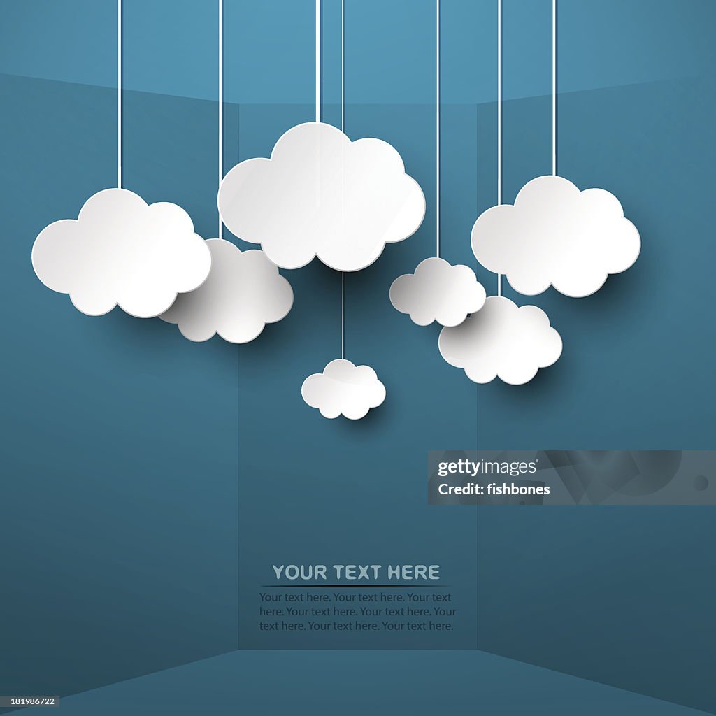 White clouds hand from strings on blue background