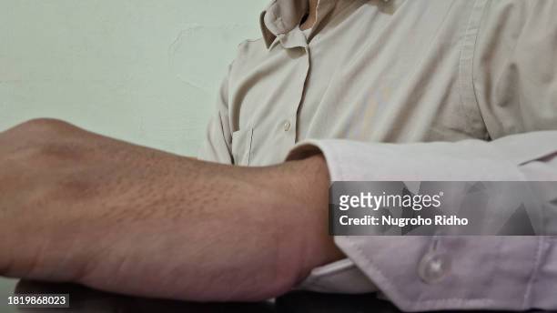 hand on the table with shirt with cuff - cuff sleeve stock pictures, royalty-free photos & images