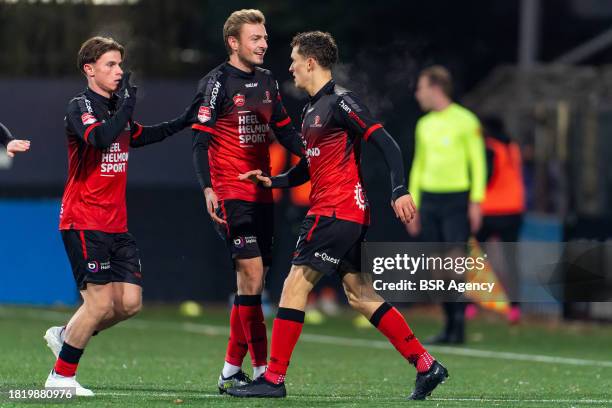 Martijn Kaars of Helmond Sport celebrates after scoring the team's second goal with Michel Ludwig of Helmond Sport and Flor van den Eynden of Helmond...