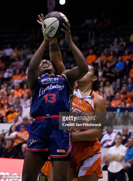 Jocelyn Willoughby of the Lightning drives to the basket during the WNBL match between Townsville Fire and Adelaide Lightning at Townsville...