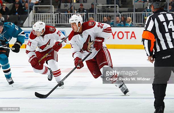 Brandon Yip of the Phoenix Coyotes skates with control of the puck against the San Jose Sharks during a preseason NHL game at SAP Center on September...