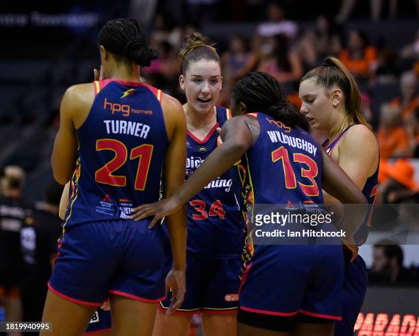 The Lightning gather in a huddle during the WNBL match between Townsville Fire and Adelaide Lightning at Townsville Entertainment Centre, on November...