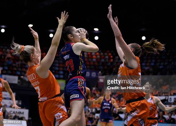 Taylor Mole of the Lightning drives to the basket during the WNBL match between Townsville Fire and Adelaide Lightning at Townsville Entertainment...