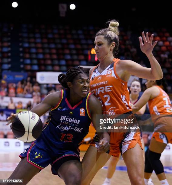 Jocelyn Willoughby of the Lightning drives to the basket during the WNBL match between Townsville Fire and Adelaide Lightning at Townsville...