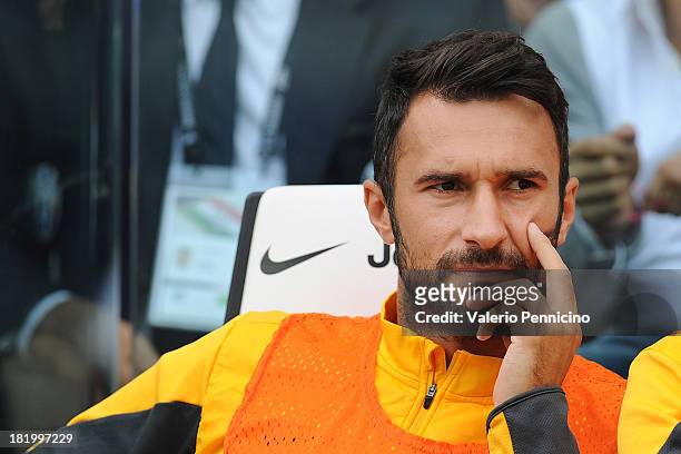 Mirko Vucinic of Juventus sits on the stand prior to the Serie A match between Juventus and Hellas Verona FC at Juventus Arena on September 22, 2013...