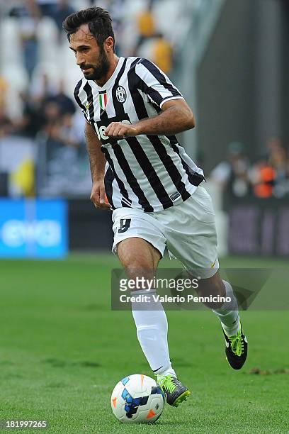 Mirko Vucinic of Juventus in action during the Serie A match between Juventus and Hellas Verona FC at Juventus Arena on September 22, 2013 in Turin,...