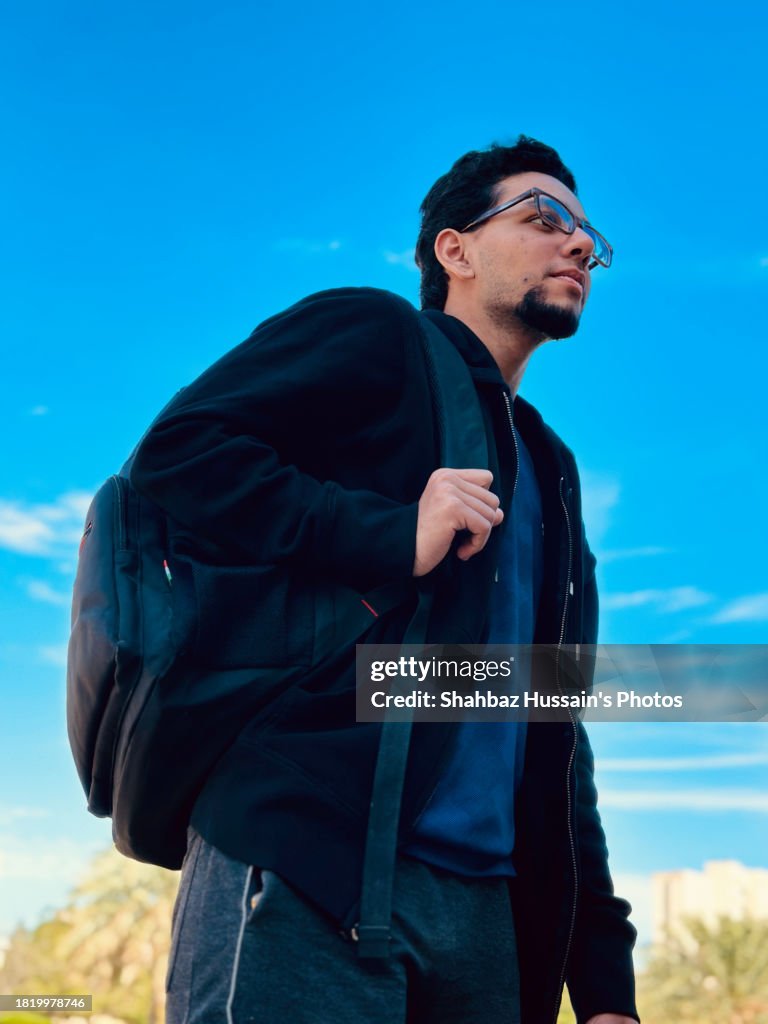 Young Man Traveling Using Backpack High-Res Stock Photo - Getty Images