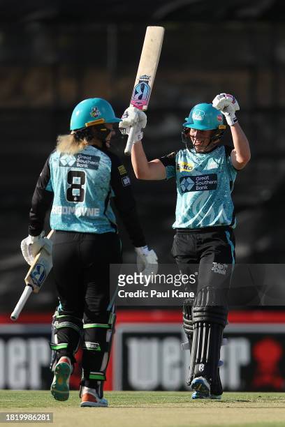 Grace Harris of the Heat celebrates her half century during The Challenger WBBL finals match between Perth Scorchers and Brisbane Heat at the WACA,...