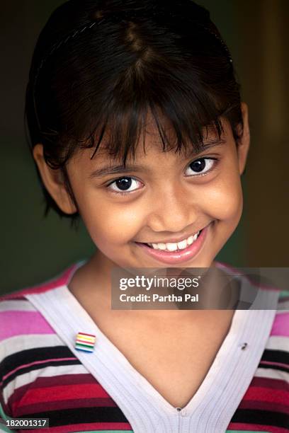 a nine year old bengali girl in different moods - bengali girl stock-fotos und bilder