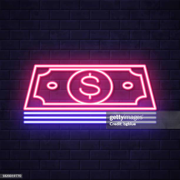 dollar banknotes. glowing neon icon on brick wall background - money stack stock illustrations