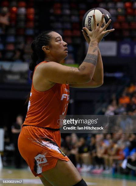 Zitina Aokuso of the Fire takes a shot during the WNBL match between Townsville Fire and Adelaide Lightning at Townsville Entertainment Centre, on...