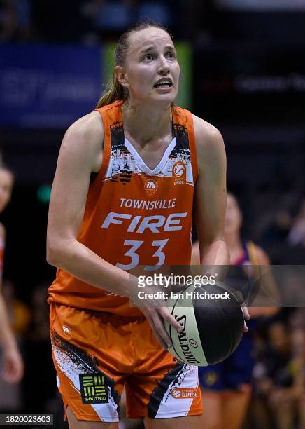 Mikaela Ruef of the Fire attempts a free throw shot during the WNBL match between Townsville Fire and Adelaide Lightning at Townsville Entertainment...