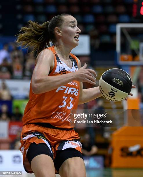 Mikaela Ruef of the Fire drives to the basket during the WNBL match between Townsville Fire and Adelaide Lightning at Townsville Entertainment...