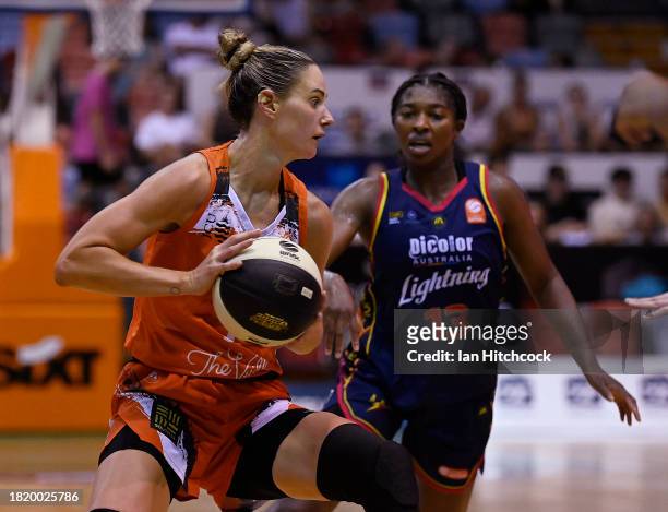 Alice Kunek of the Fire drives to the basket during the WNBL match between Townsville Fire and Adelaide Lightning at Townsville Entertainment Centre,...