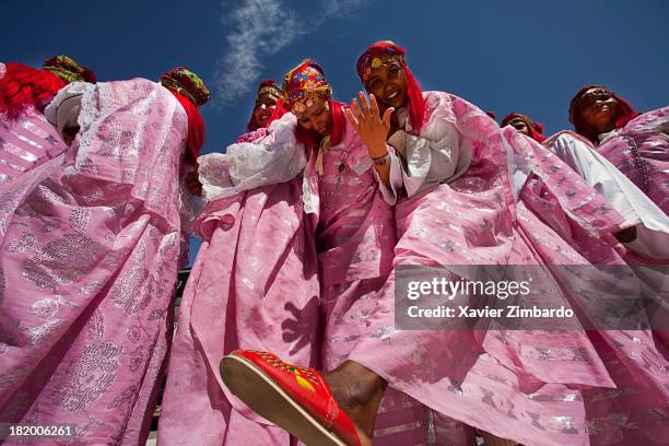 Women dancing at Moussem Roses on May 9, 2009 at Kelaa M'Gouna, Dades Valley, High Atlas, Morocco.