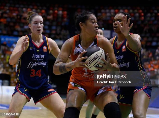 Zitina Aokuso of the Fire drives to the basket during the WNBL match between Townsville Fire and Adelaide Lightning at Townsville Entertainment...