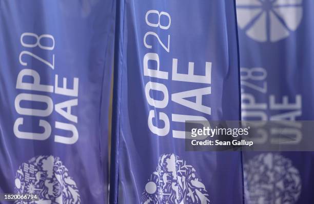 Banners fly at the UNFCCC COP28 Climate Conference the day before its official opening on November 29, 2023 in Dubai, United Arab Emirates. The COP28...