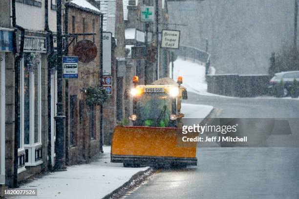 Plough spreads grit on November 29, 2023 in Ballater Scotland. On Tuesday, the Met Office issued a warning for snow and ice from 5pm onwards,...