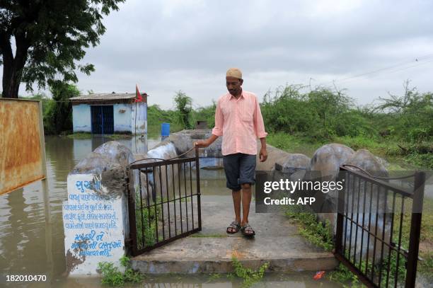 The munjawar or caretaker of The Pir Gebanshah Step Well Zakir Diwan walks at the well in the village of Aligdh near Viramgam, some 65kms. From...