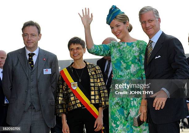 Antwerp mayor Bart De Wever, Antwerp province governor Cathy Berx, Queen Mathilde of Belgium and King Philippe of Belgium arrive for the "Joyous...
