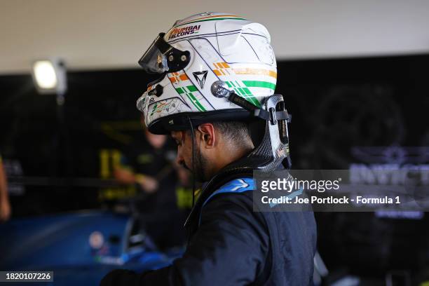 Kush Maini of India and Invicta Virtuosi Racing prepares to drive in the garage during day 1 of Formula 2 testing at Yas Marina Circuit on November...