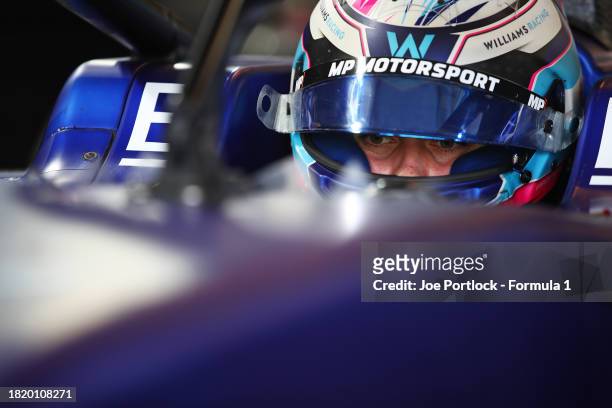 Franco Colapinto of Argentina and MP Motorsport prepares to drive in the garage during day 1 of Formula 2 testing at Yas Marina Circuit on November...