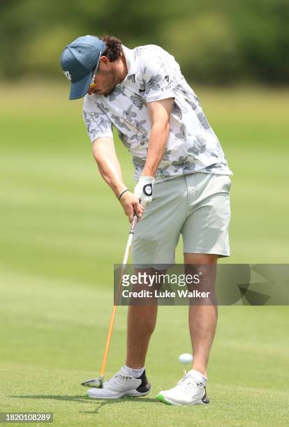 Ewen Ferguson of Scotland plays a shot prior to the Investec South African Open Championship at Blair Atholl Golf & Equestrian Estate on November 29,...