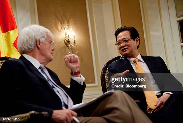 Nguyen Tan Dung, Vietnam's prime minister, right, speaks with Albert "Al" Hunt, columnist with Bloomberg View, during an interview in New York, U.S.,...