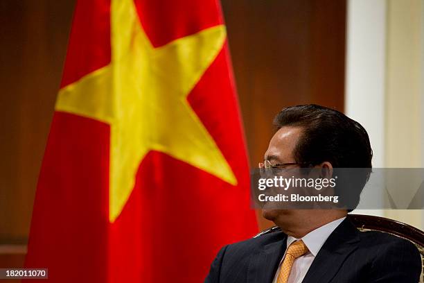 Nguyen Tan Dung, Vietnam's prime minister, listens during an interview in New York, U.S., on Friday, Sept. 27, 2013. Vietnams economic growth...