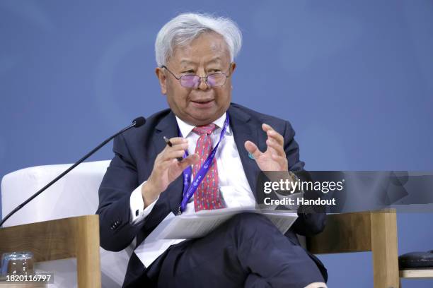 In this handout image supplied by COP28, President of the Asian Infrastructure Investment Bank, Jin Liqun speaks during Available, Accessible and...