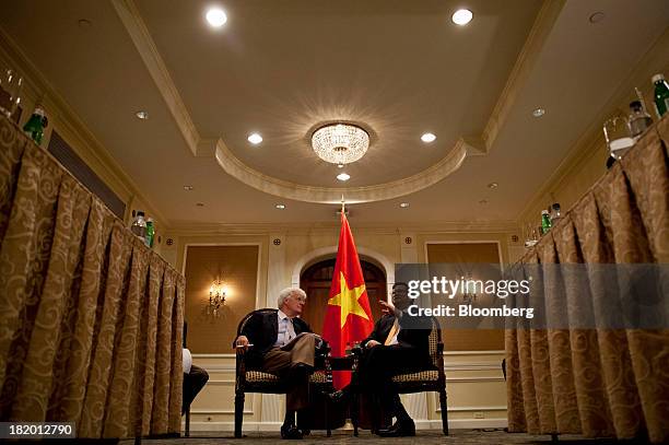 Nguyen Tan Dung, Vietnam's prime minister, right, speaks with Albert "Al" Hunt, columnist with Bloomberg View, during an interview in New York, U.S.,...