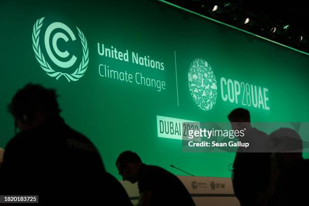 Technicians prepare a plenary hall at the UNFCCC COP28 Climate Conference the day before its official opening on November 29, 2023 in Dubai, United...