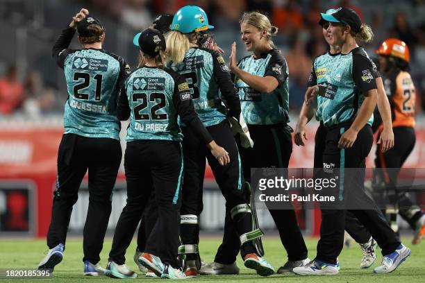 Georgia Voll of the Heat celebrates the wicket of Alana King of the Scorchers during The Challenger WBBL finals match between Perth Scorchers and...