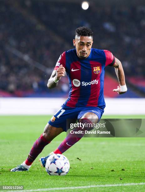 Rafinha of FC Barcelona runs with the ball during the UEFA Champions League match between FC Barcelona and FC Porto at Estadi Olimpic Lluis Companys...