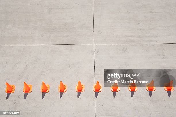 row of traffic cones - road cone stock pictures, royalty-free photos & images