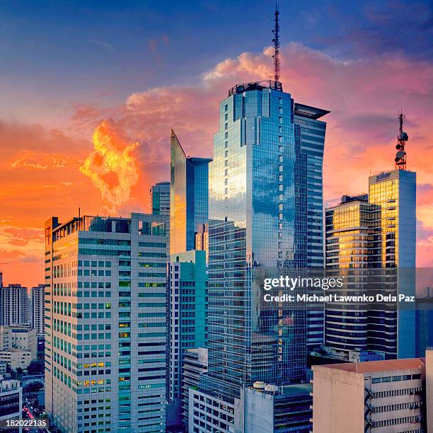 city sunset - makati stock-fotos und bilder