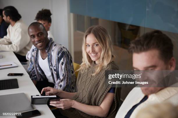 diverse team having business meeting in conference room - built space stock pictures, royalty-free photos & images