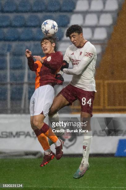 Ethan Wheatley of Manchester United is in action with Efe Akman of Galatasaray during the UEFA Youth League match between Galatasaray A.S. And...