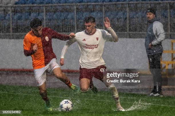 James Scanlon of Manchester United is in action with Ali Turap Bulbul of Galatasaray during the UEFA Youth League match between Galatasaray A.S. And...