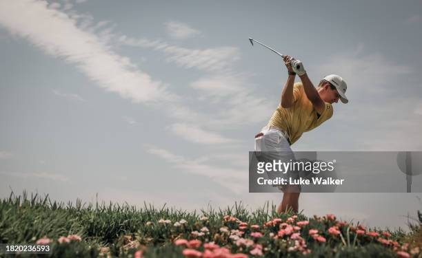 Christiaan Maas of South Africa Am plays a shot prior to the Investec South African Open Championship at Blair Atholl Golf & Equestrian Estate on...