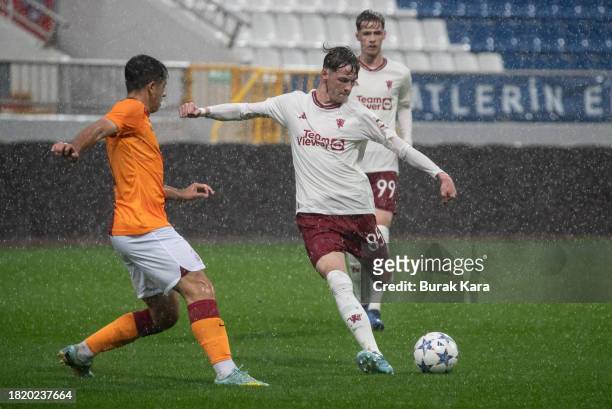 Jack Fletcher of Manchester United kicks the ball for goal during the UEFA Youth League match between Galatasaray A.S. And Manchester United at on...