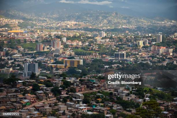 Buildings stand in Tegucigalpa, Honduras, on Tuesday, Sept. 3, 2013. Economic growth in Honduras is forecast to slow to 3 percent this year from 3.3...