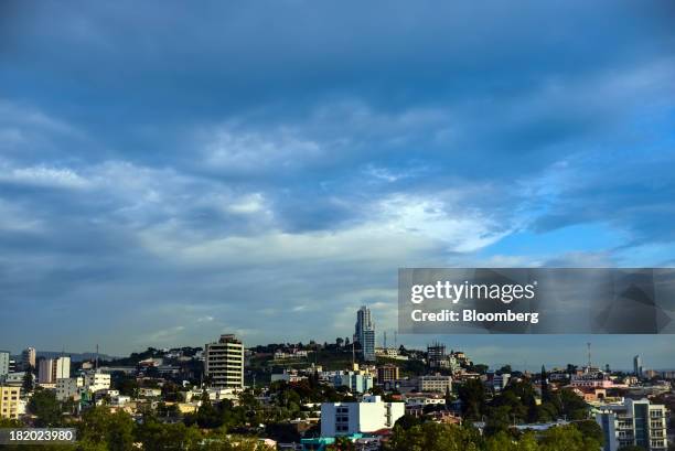 The Sky Residence Club, back center, the tallest building in the city, stands in Tegucigalpa, Honduras, on Tuesday, Sept. 3, 2013. Economic growth in...