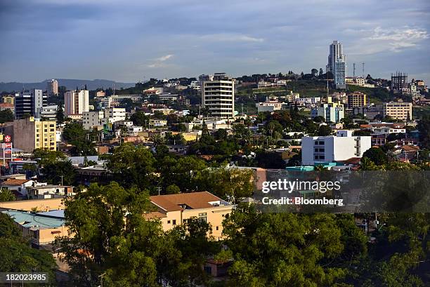 The Sky Residence Club, back right, the tallest building in the city, stands in Tegucigalpa, Honduras, on Tuesday, Sept. 3, 2013. Economic growth in...