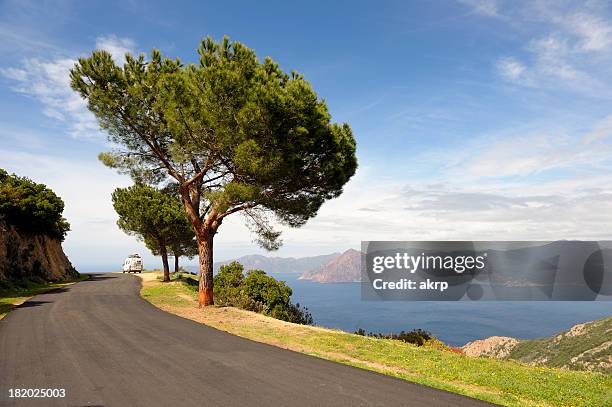 coastal road on the island of corsica - corsica france stock pictures, royalty-free photos & images