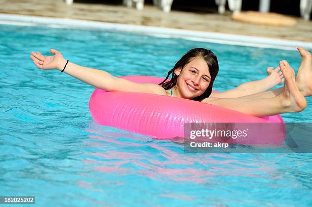 Tween Floating Inpool Teen Pool Float Photos and Premium High Res Pictures - Getty Images