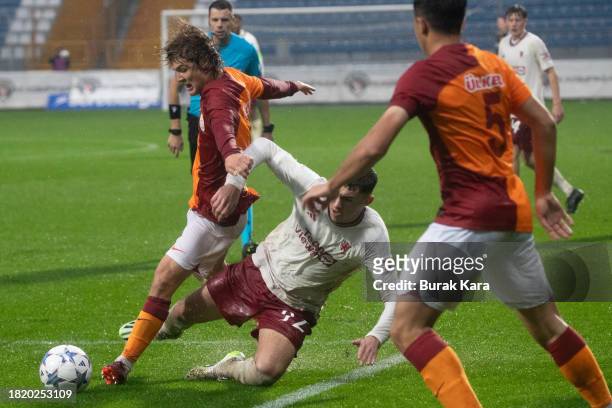 James Scanlon of Manchester United is in action with Efe Akman of Galatasaray during the UEFA Youth League match between Galatasaray A.S. And...