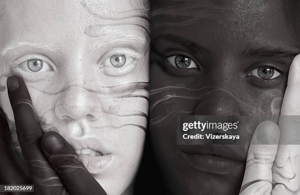 black and white twins - embracing differences stock pictures, royalty-free photos & images