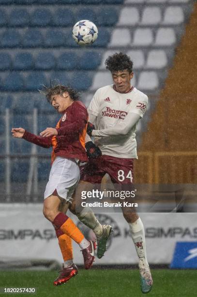Ethan Wheatley of Manchester United is in action with Efe Akman of Galatasaray during the UEFA Youth League match between Galatasaray A.S. And...