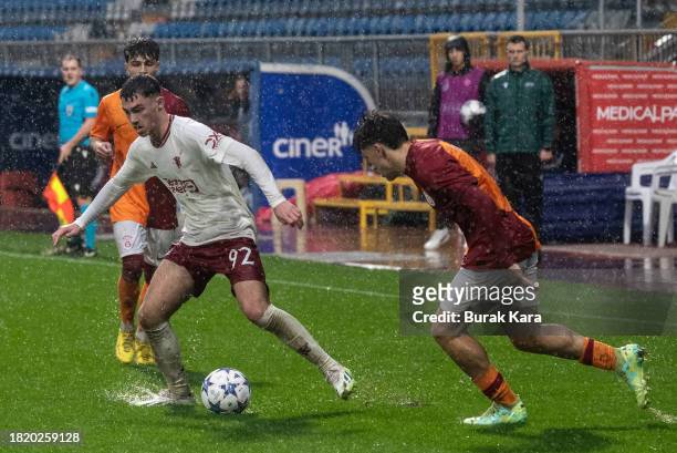 James Scarlon of Manchester United is in action with Gokdeniz Gurpuz of Galatasaray during the UEFA Youth League match between Galatasaray A.S. And...